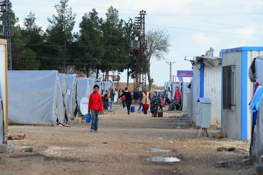 Unnamed  syrian (kurdish) people in refugee camp in Suruc. These people are refugees from Kobane and escaped because of Islamic state attack. April 3, 2015; Suruc, Turkey