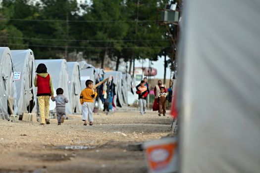 Unnamed  syrian (kurdish) people in refugee camp in Suruc. These people are refugees from Kobane and escaped because of Islamic state attack. April 3, 2015; Suruc, Turkey