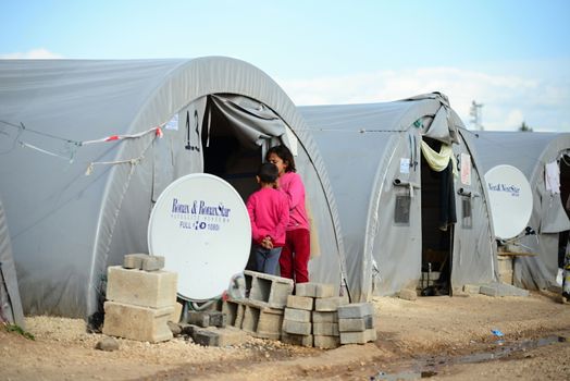 Unnamed  syrian (kurdish) people in refugee camp in Suruc. These people are refugees from Kobane and escaped because of Islamic state attack. April 3, 2015; Suruc, Turkey