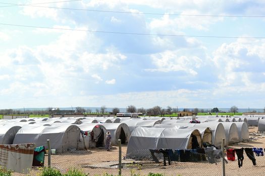 Syrian people in refugee camp in Suruc. These people are refugees from Kobane and escaped because of Islamic state attack. 30.3.2015, Suruc, Turkey