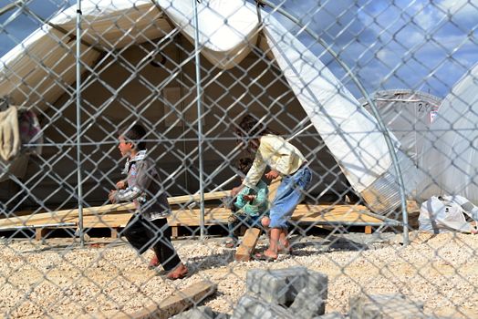 Syrian people in refugee camp in Suruc. These people are refugees from Kobane and escaped because of Islamic state attack. 30.3.2015, Suruc, Turkey