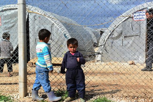 Syrian people in refugee camp in Suruc. These people are refugees from Kobane and escaped because of Islamic state attack. 30.3.2015, Suruc, Turkey