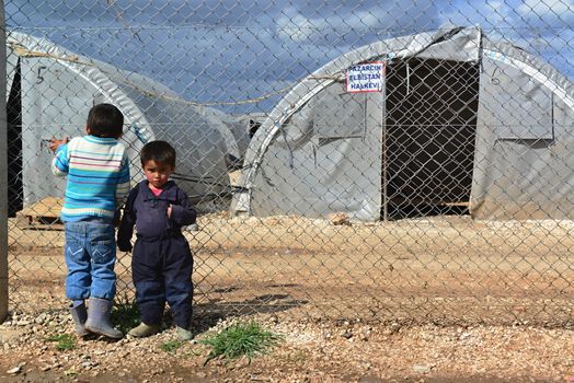 Syrian people in refugee camp in Suruc. These people are refugees from Kobane and escaped because of Islamic state attack. 30.3.2015, Suruc, Turkey