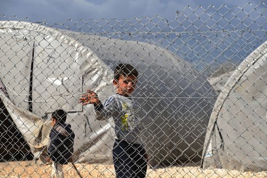 Syrian people in refugee camp in Suruc. These people are refugees from Kobane and escaped because of Islamic state attack. 30.3.2015, Suruc, Turkey