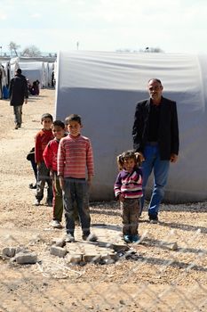 Syrian people in refugee camp in Suruc. These people are refugees from Kobane and escaped because of Islamic state attack. 30.3.2015, Suruc, Turkey