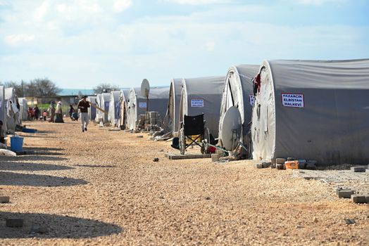 Syrian people in refugee camp in Suruc. These people are refugees from Kobane and escaped because of Islamic state attack. 30.3.2015, Suruc, Turkey