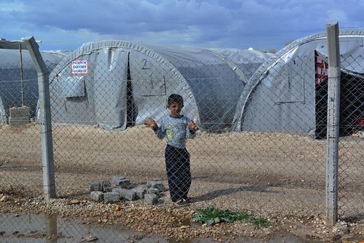 Syrian people in refugee camp in Suruc. These people are refugees from Kobane and escaped because of Islamic state attack. 30.3.2015, Suruc, Turkey