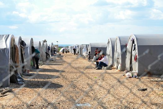 Syrian people in refugee camp in Suruc. These people are refugees from Kobane and escaped because of Islamic state attack. 30.3.2015, Suruc, Turkey