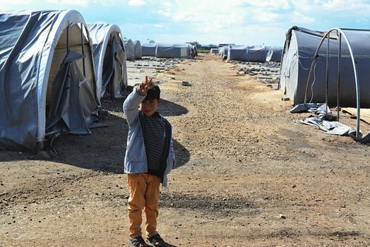 Syrian people in refugee camp in Suruc. These people are refugees from Kobane and escaped because of Islamic state attack. 30.3.2015, Suruc, Turkey