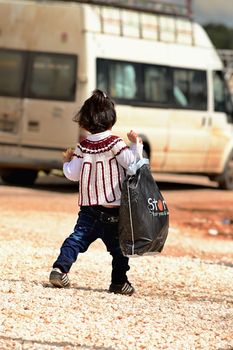 many children returning into Konbane with their parents. 3.4.2015, Kobane, Syria