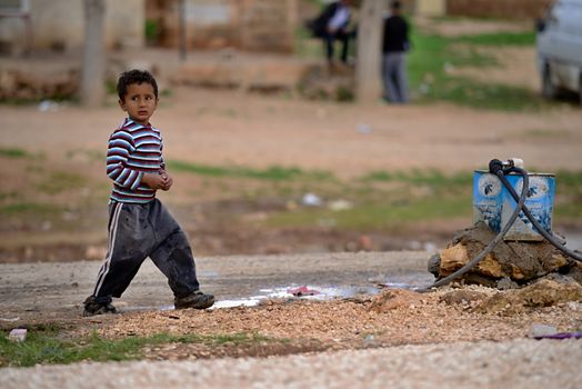 many children returning into Konbane with their parents. 3.4.2015, Kobane, Syria