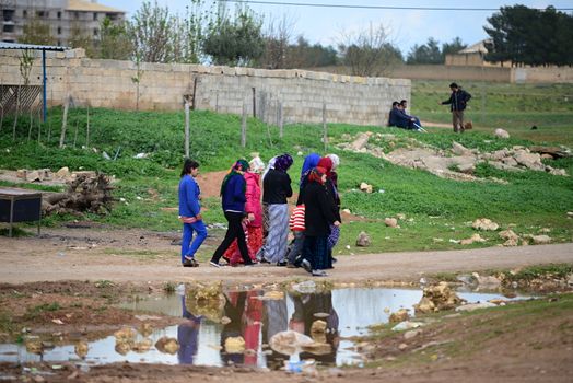 many children returning into Konbane with their parents. 3.4.2015, Kobane, Syria