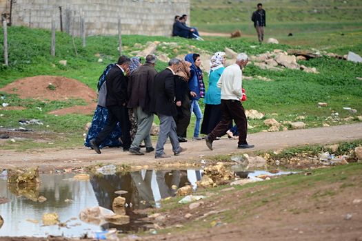 many children returning into Konbane with their parents. 3.4.2015, Kobane, Syria