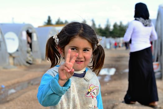 Syrian people in refugee camp in Suruc. These people are refugees from Kobane and escaped because of Islamic state attack. 3.4.2015, Suruc, Turkey