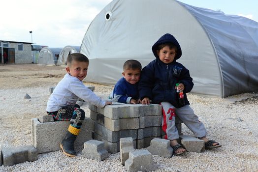 Syrian people in refugee camp in Suruc. These people are refugees from Kobane and escaped because of Islamic state attack. 3.4.2015, Suruc, Turkey