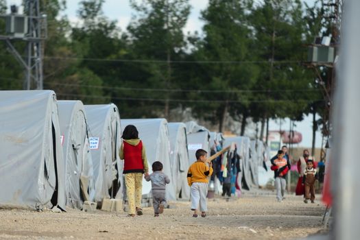 Syrian people in refugee camp in Suruc. These people are refugees from Kobane and escaped because of Islamic state attack. 3.4.2015, Suruc, Turkey