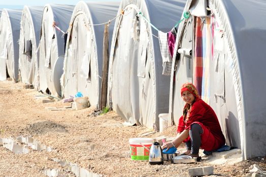 Syrian people in refugee camp in Suruc. These people are refugees from Kobane and escaped because of Islamic state attack. 3.4.2015, Suruc, Turkey