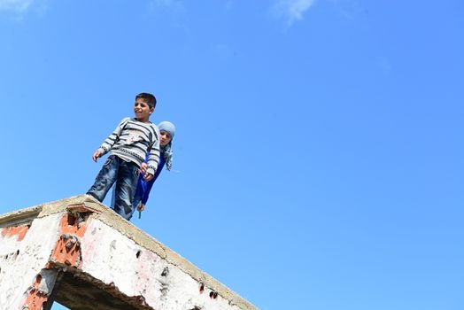 Syrian people in refugee camp in Suruc. These people are refugees from Kobane and escaped because of Islamic state attack. 3.4.2015, Suruc, Turkey