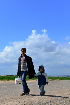 Syrian people in refugee camp in Suruc. These people are refugees from Kobane and escaped because of Islamic state attack. 3.4.2015, Suruc, Turkey