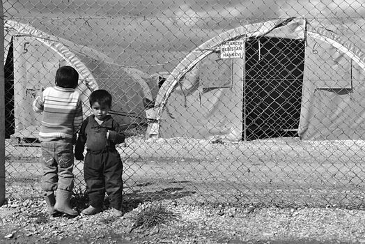 Syrian people in refugee camp in Suruc. These people are refugees from Kobane and escaped because of Islamic state attack. 30.3.2015, Suruc, Turkey