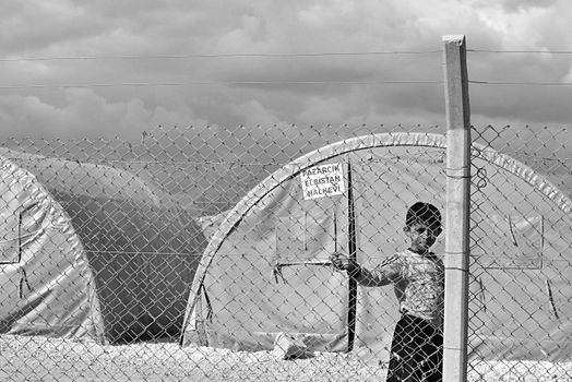 Syrian people in refugee camp in Suruc. These people are refugees from Kobane and escaped because of Islamic state attack. 30.3.2015, Suruc, Turkey