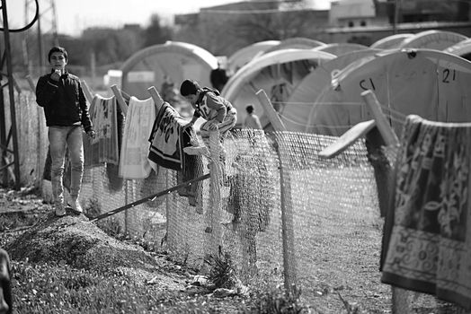 Syrian people in refugee camp in Suruc. These people are refugees from Kobane and escaped because of Islamic state attack. 30.3.2015, Suruc, Turkey