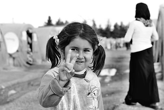 Syrian people in refugee camp in Suruc. These people are refugees from Kobane and escaped because of Islamic state attack. 3.4.2015, Suruc, Turkey