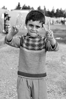Syrian people in refugee camp in Suruc. These people are refugees from Kobane and escaped because of Islamic state attack. 3.4.2015, Suruc, Turkey