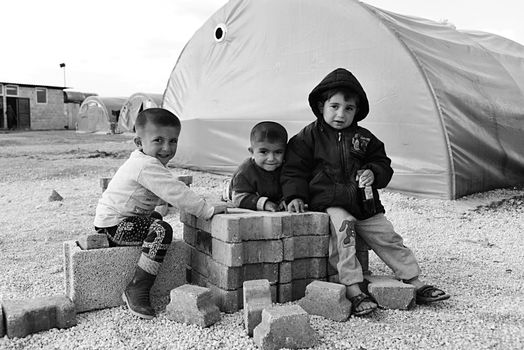 Syrian people in refugee camp in Suruc. These people are refugees from Kobane and escaped because of Islamic state attack. 3.4.2015, Suruc, Turkey