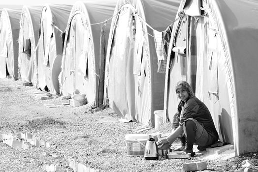 Syrian people in refugee camp in Suruc. These people are refugees from Kobane and escaped because of Islamic state attack. 3.4.2015, Suruc, Turkey
