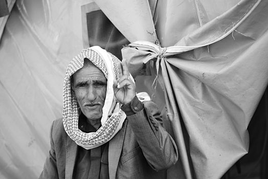 Syrian people in refugee camp in Suruc. These people are refugees from Kobane and escaped because of Islamic state attack. 3.4.2015, Suruc, Turkey