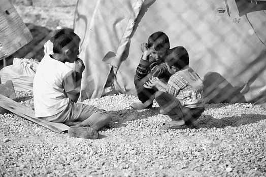 Syrian people in refugee camp in Suruc. These people are refugees from Kobane and escaped because of Islamic state attack. 3.4.2015, Suruc, Turkey