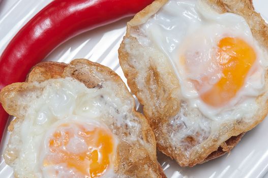 Incoming quail eggs on a white plate