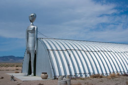 RACHEL, NEVADA/USA – March 30, 2010: The tall metal Alien figure at the Alien Research Center located on Nevada's Extraterrestrial Highway near Area 51.