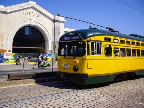 SAN FRANCISCO, CA/USA– SEPT 10 2012: San Francisco's original double-ended PCC streetcars, at San Francisco Pier 15. Popular with tourists the streetcar tram design was first built in USA in 1930s.