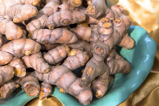 Heaps of  turmeric roots