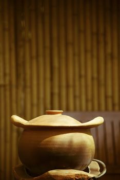 Traditional clay pot cooking  in Thai kitchen add color retro style