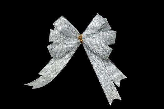 Silver ribbon in shape of gift bow