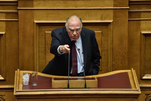 GREECE, Athens : Vassilis Leventis leader of the Union of Centrists addresses the MPs during a parliamentary session ahead of a voting, in Athens, Greece December 15, 2015. Greek parliament votes on reforms needed for the country to receive further financial aid from its international lenders. 