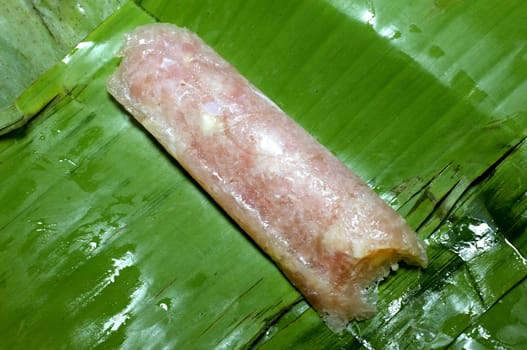 Sour pork in banana leaf package, Thai food