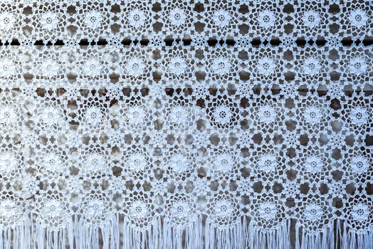 the vintage white woven lace patterned tablecloth
