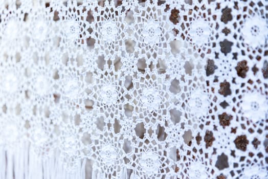 the vintage white woven lace patterned tablecloth