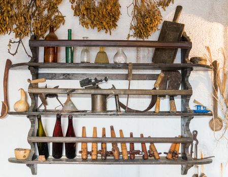 the various antique tools and household items