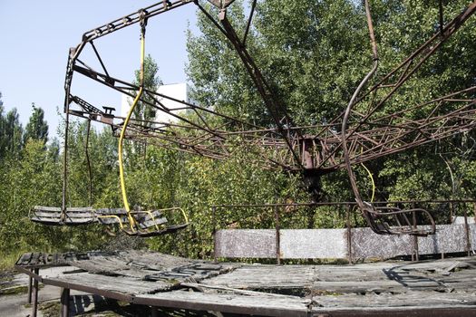 Children playgrounds in Pripyat - abandoned city near Chernobyl nuclear reactor. Whole city was abandoned after nuclear disaster on 26.04.1986