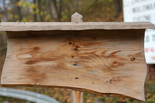Empty wooden table, ready for your sign