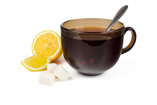 Cup of tea lemon slice and sugar on a white background