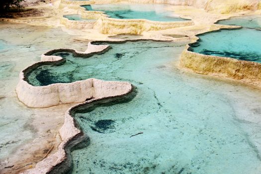Amaizing colorful ponds in Huanglong natinal park in Sichuan, China