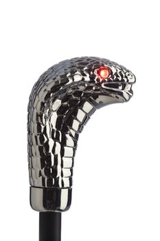 Chromed cobra head with glittering red eyes. Isolated on white.