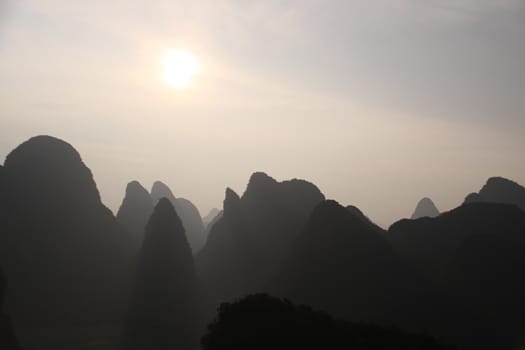 Amaizing Yangshuo valley in China from a hot air balloon at sunset