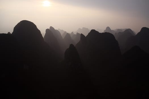 Amaizing Yangshuo valley in China from a hot air balloon at sunset